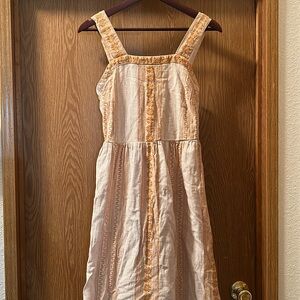 Cotton rye, mid calf dress. 
Worn once for a wedding.